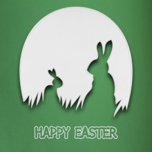 Creative Easter concept photo of two rabbits in a paper egg on a green background