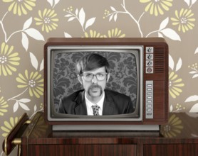 Nerd retro 60s vintage tv presenter hero on wood television wallpaper
