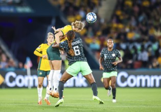 BRISBANE, AUSTRALIA, JULY 27: Ifeoma ONUMONU of Nigeria and Clare Hunt of Australia compete as