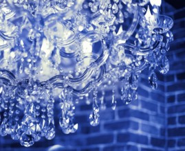 Chrystal chandelier close up. Glamour background with copy space