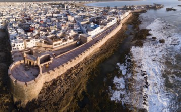 Aerial panorama of medieval Essaouira old city on Atlantic coast at sunset, Morocco, Africa