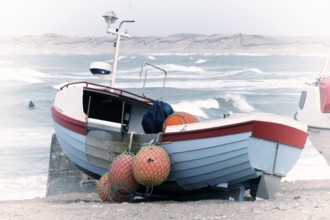 Danish fishing boat on the beach