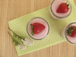 Strawberry dessert with gelatine and fresh strawberries