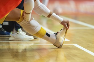 The leg of a futsal player during warm-up