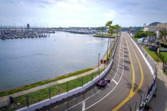 INDYCAR Series driver, KYLE KIRKWOOD (27) of Jupiter, Florida, travels through the turns during a