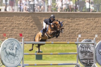 Sameh el Dahan of Great Britain, riding WKD Toronto, compete in the 1.60m Grand Prix during The