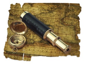 Traveling theme: vintage telescope and compass at antique (17 century) map over white