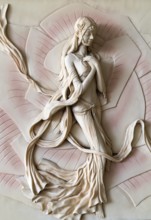 Stone bas-relief in the form of a girl elf