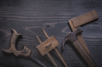 Rusted hand saw wooden marking gauge claw hammer square ruler