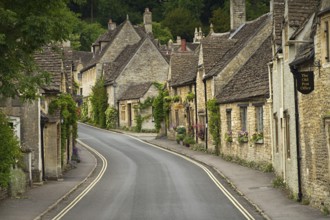 Cottages and main street in Castle Combe, Cotswolds, UK
