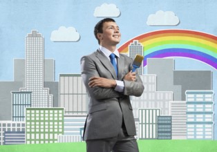 Confident and creative businessman painter standing with arms folded. Happy handsome man in