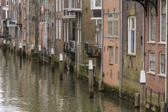 Detailed image of the facades of houses along a canal, Dordrecht, holland, netherlands