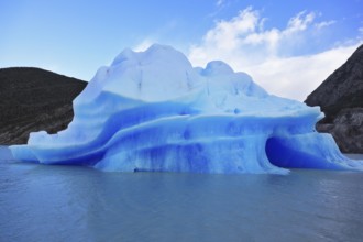 Journey to the End of the World. Chilean Patagonia in the sunlight. Blue Ice Glacier Gray is