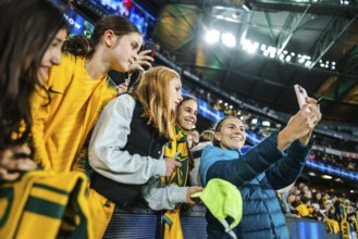 MELBOURNE, AUSTRALIA, JULY 14 : Steph Catley of Australia with fans post match after beating France