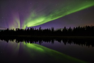 Northern lights reflected in a lake, Norrbotten, Lapland, Sweden, September 2014, Europe
