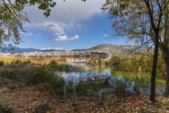 Autumn color landscape view of Lake Orestiada and the city of Kastoria in northern Greece