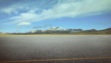 View of the empty asphalt road with beautiful mountain landscape