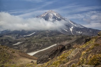 Mountains and volcanoes. Beautiful landscape of Kamchatka Peninsula: summer panoramic view of