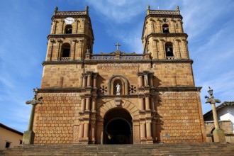 Front view of impressive colonial Cathedral of the Immaculate Conception against blue sky and veil