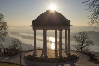 Beautiful temple in a landscape shot. Sunrise on a winter morning. Beautiful view along the Rhine