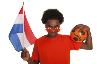 Young boy in orange as Dutch soccer supporter