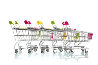 Row empty shopping carts isolated white background
