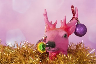 Christmas reindeer with golden ornaments