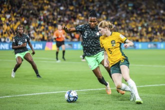 BRISBANE, AUSTRALIA, JULY 27: Cortnee Vine of Australia and Osinachi OHALE of Nigeria compete as