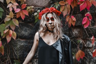 Closeup portrait of Calavera Catrina. Young woman with sugar skull makeup. Dia de los muertos. Day