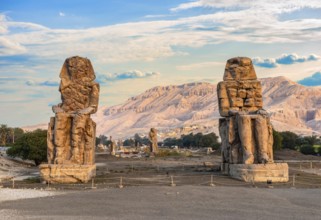 Colossi of Memnon in Luxor at sunrise, front view
