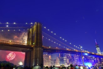 July 4th 2014 fireworks at Brooklyn bridge Manhattan skyline New York USA