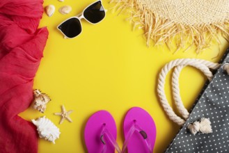 Straw hat sunglesses flip flops beach bag on yellow background vacation travel planning mockup