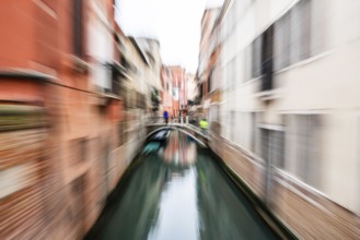 Bridge over a canal, zoom effect, Venice, Italy, Europe