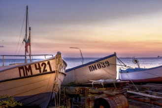 Pomorie, Bulgaria, September 15, 2020: Beachfront sea panorama with fishing boats in the town and