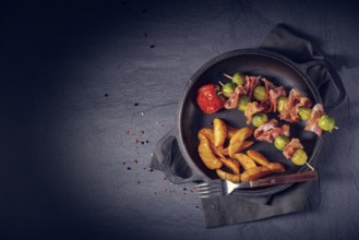 Brussels sprouts and bacon skewers with potato widgets