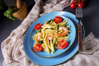 Strozzapreti pasta with spinach and prawns
