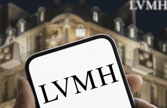 LVMH logo is displayed on smartphone
