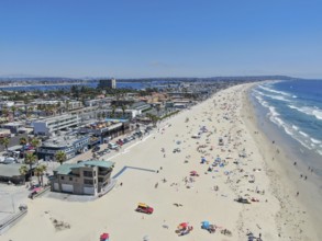 Aerial view of people at the beach during blue summer day. Pacific Beach in San Diego, California