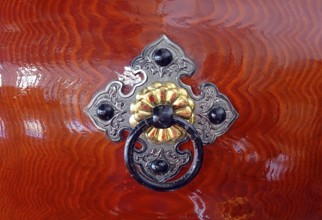 Silver color and brass color bronze fittings on a Japanese wooden Taiku drum