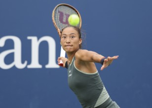 Tennis player Qinwen Zheng of China in action at the US Open 2024 Championships, Billie Jean King