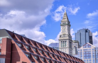 The Custom House Tower along the Boston, Massachusetts skyline on a sunny day