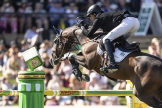 Vaclav Stanek of Czech Republic and riding Quintin compete in the first round of the 1.60m CPKC