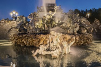 Place des Quinconces and Girondins fountain monument at night, Bordeaux, Aquitaine, France. High