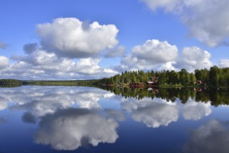 Gaevunda with a lake in Sweden at autum, dalarna laen. Gaevunda in Schweden