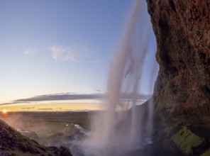 Sunset at Seljalandsfoss waterfall, South Iceland, Iceland, Europe