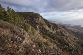 Tenerife mountain landscape. Trekking path. Adeje and Las Americas coastline in the background