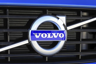 TURKU, FINLAND, JULY 29, 2017: Sign Volvo on the grille of a new blue car. Carmaker Volvo announces