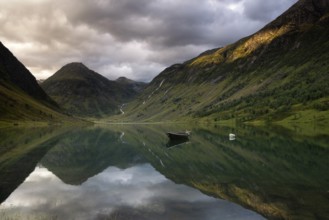 Evening view at Lake Anestolsvatnet which is surrounded by beautiful mountains and is situated