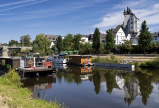 View over the river Lahn to the Grafenschloss castle in the german city Diez