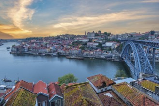 Porto Portugal, sunrise city skyline at Porto Ribeira with Douro River and Dom Luis I Bridge